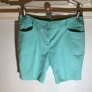 Aqua golf shorts. New